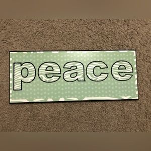 Used “Peace” Wall Plaque.